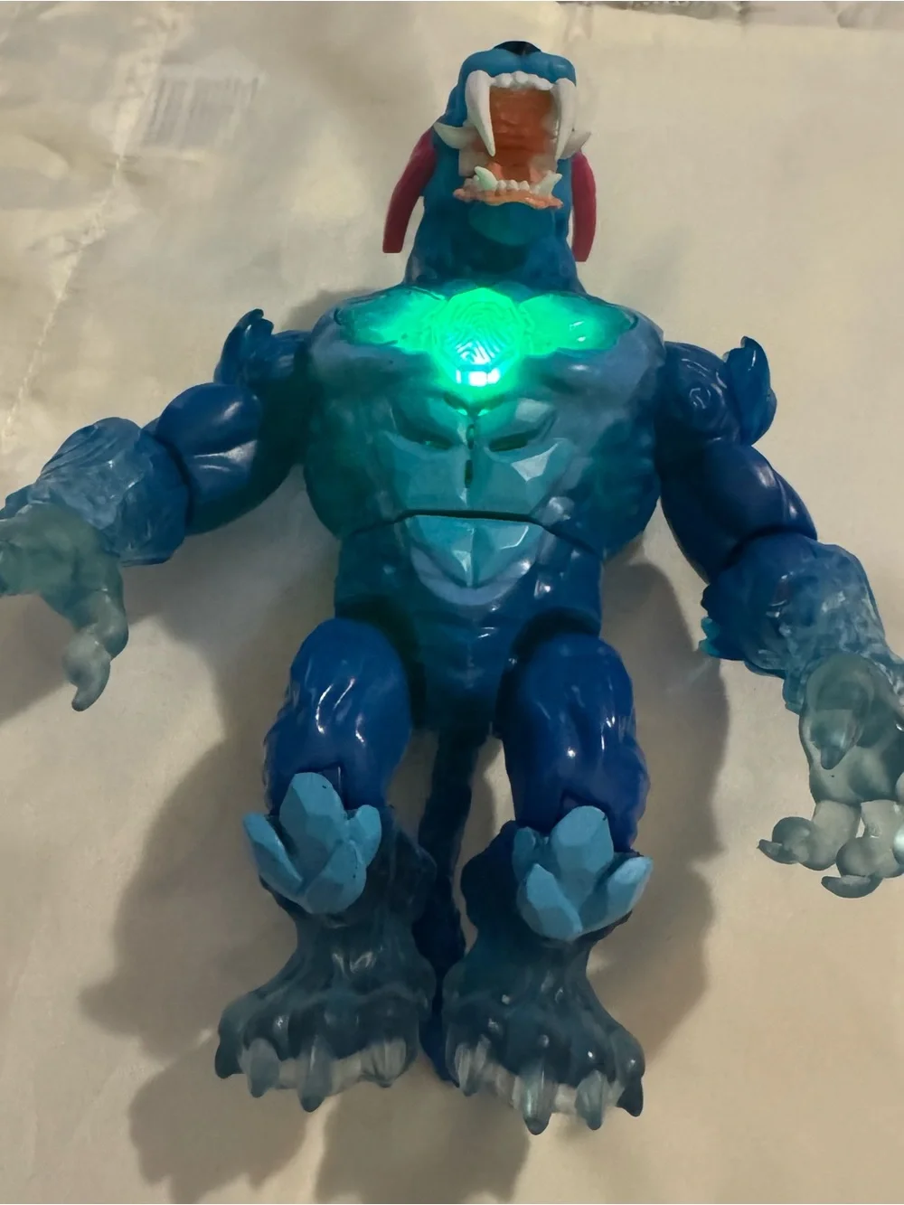 Blue Light-Up Monster Action Figure with Green Chest Glow